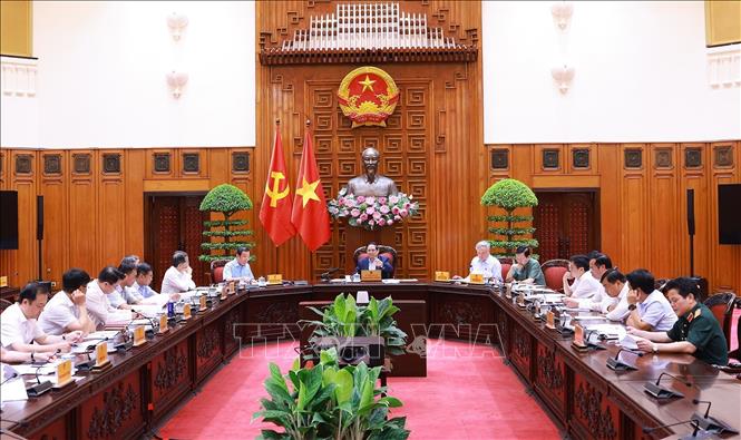 Thủ tướng Phạm Minh Chính chủ trì cuộc họp Thường trực Chính phủ về trung tâm tài chính quốc tế tại Thành phố Hồ Chí Minh và Đà Nẵng. Ảnh: Dương Giang-TTXVN
