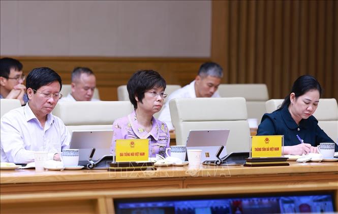 Lãnh đạo các bộ, cơ quan thuộc Chính phủ tham dự phiên họp lần thứ tư của Ban Chỉ đạo Trung ương triển khai xoá nhà tạm, nhà dột nát. Ảnh: Dương Giang-TTXVN