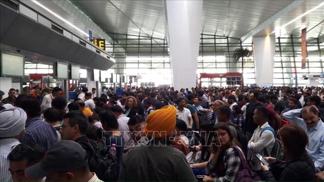 (Tư liệu) Hành khách tại sân bay quốc tế Indira Gandhi ở New Delhi, Ấn Độ. Ảnh: ANI/TTXVN