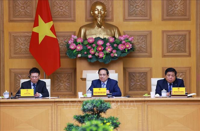Thủ tướng Phạm Minh Chính gặp mặt đại diện các doanh nghiệp Hoa Kỳ đang đầu tư, kinh doanh tại Việt Nam. Ảnh: Dương Giang-TTXVN
