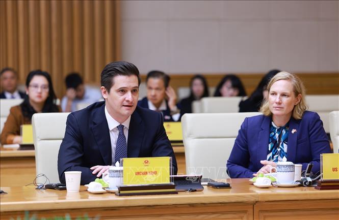 Ông Eric Johnson, Chủ tịch Phòng Thương mại Hoa Kỳ tại Hà Nội phát biểu. Ảnh: Dương Giang-TTXVN 
