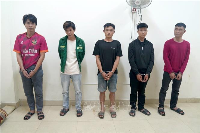 Các đối tượng tại cơ quan Công an. Ảnh: TTXVN phát