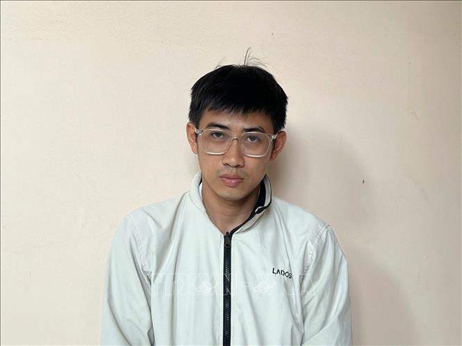 Đối tượng Phạm Thành Nhẫn tại cơ quan điều tra. Ảnh: TTXVN phát