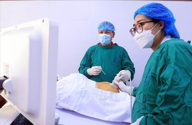Trung tâm Chẩn đoán trước sinh – Bệnh viện Phụ sản Trung ương ứng dụng công nghệ cao trong chăm sóc sức khỏe sinh sản. Ảnh: Tuấn Anh - TTXVN 