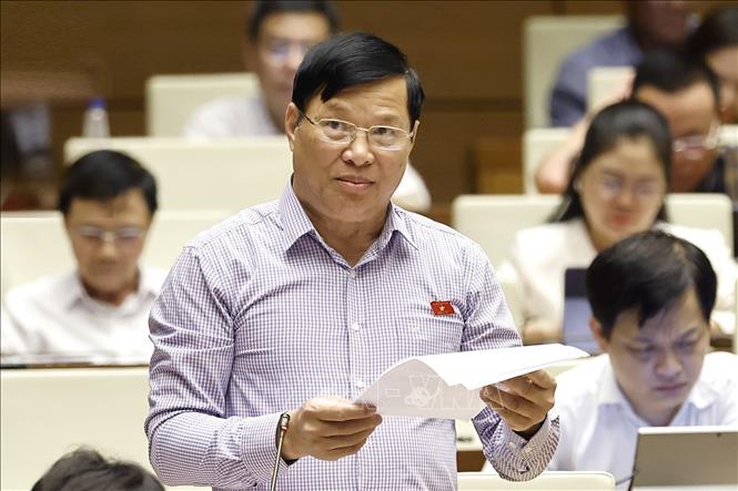 Đại biểu Quốc hội tỉnh Vĩnh Phúc Trần Văn Tiến phát biểu. Ảnh: Doãn Tấn - TTXVN