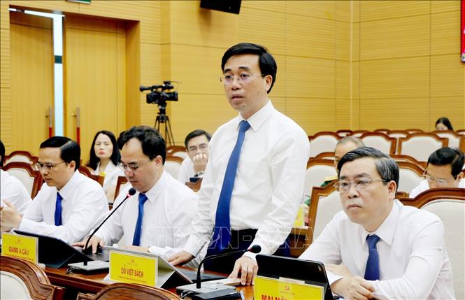 Đại biểu thảo luận về các nội dung trình tại Hội nghị. Ảnh: TTXVN phát