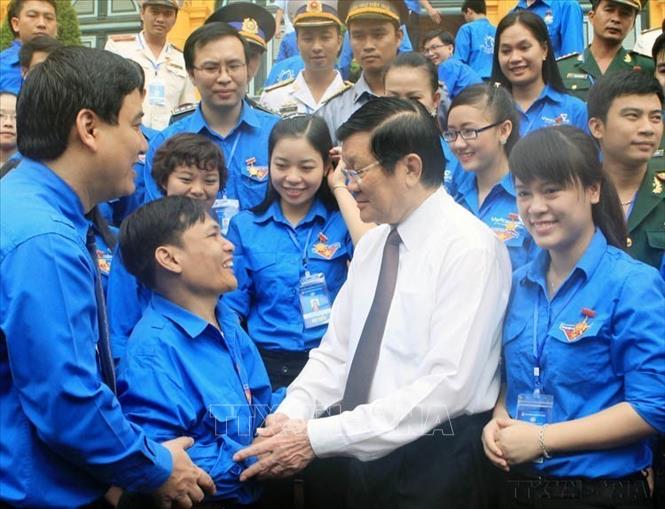 Chủ tịch nước Trương Tấn Sang gặp mặt thân mật Đoàn đại biểu Thanh niên có thành tích xuất sắc trong lao động, học tập, công tác, về Thủ đô dự  Đại hội Thanh niên tiên tiến làm theo lời Bác toàn quốc lần thứ 3 năm 2014. Ảnh: Nguyễn Khang - TTXVN