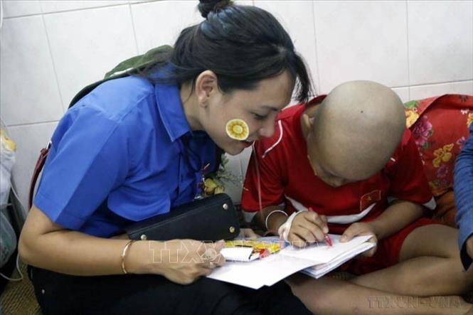  336 đại biểu thanh niên dự Đại hội Thanh niên tiên tiến làm theo lời Bác lần thứ V năm 2018 tham gia các hoạt động thiện nguyện tại Thành phố Hồ Chí Minh. Ảnh: Hoàng Hải-TTXVN