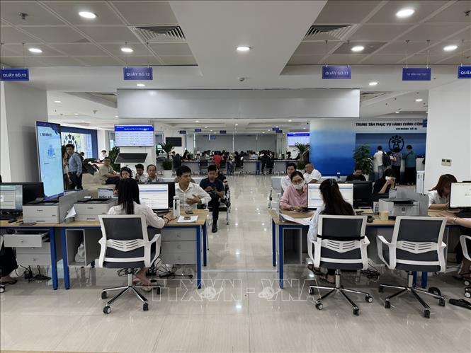 Người dân được phân luồng phù hợp.Ảnh: Quốc Lũy - TTXVN