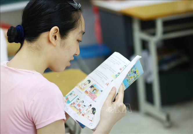Em Thanh Huyền (35 tuổi) đã tham gia lớp học được 10 năm. Ảnh: Phương Hoa - TTXVN