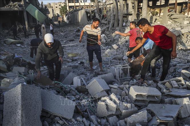 Các tòa nhà bị phá hủy sau cuộc không kích của Israel tại trại tị nạn Jabalia, Dải Gaza. Ảnh: THX/TTXVN