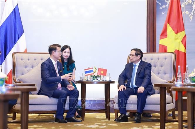 Thủ tướng Phạm Minh Chính tiếp ông Chongrak Rattanapian, Phó Chủ tịch Ngân hàng Kasikornbank (KBank) của Thái Lan. Ảnh: Dương Giang-TTXVN 