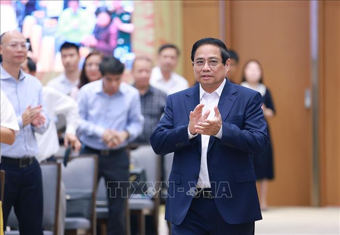 Thủ tướng Phạm Minh Chính đến dự Phiên họp thứ hai của BCĐ về phát triển khoa học, công nghệ, đổi mới sáng tạo, chuyển đổi số và Đề án 06. Ảnh: Dương Giang-TTXVN 
