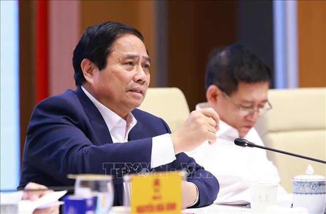 Thủ tướng Phạm Minh Chính chủ trì Phiên họp thứ hai của BCĐ về phát triển khoa học, công nghệ, đổi mới sáng tạo, chuyển đổi số và Đề án 06. Ảnh: Dương Giang-TTXVN 