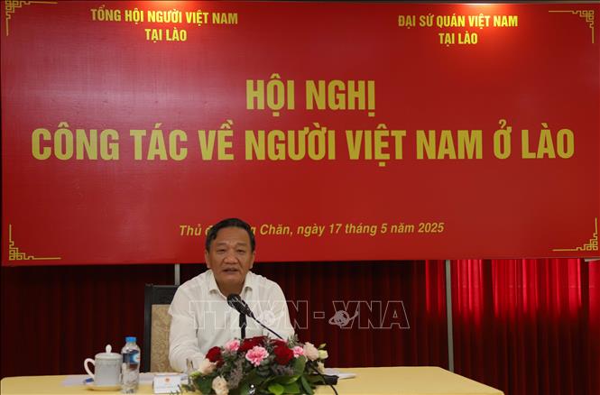 Đại sứ Việt Nam tại Lào Nguyễn Minh Tâm phát biểu chỉ đạo tại Hội nghị. Ảnh: Xuân Tú - PV TTXVN tại Lào
