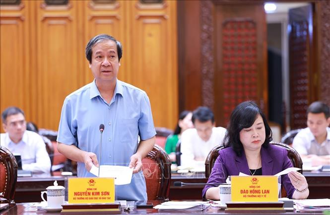 Bộ trưởng Bộ Giáo dục và Đào tạo Nguyễn Kim Sơn trình bày dự thảo Chương trình mục tiêu quốc gia về phát triển giáo dục, đào tạo. Ảnh: Dương Giang-TTXVN 