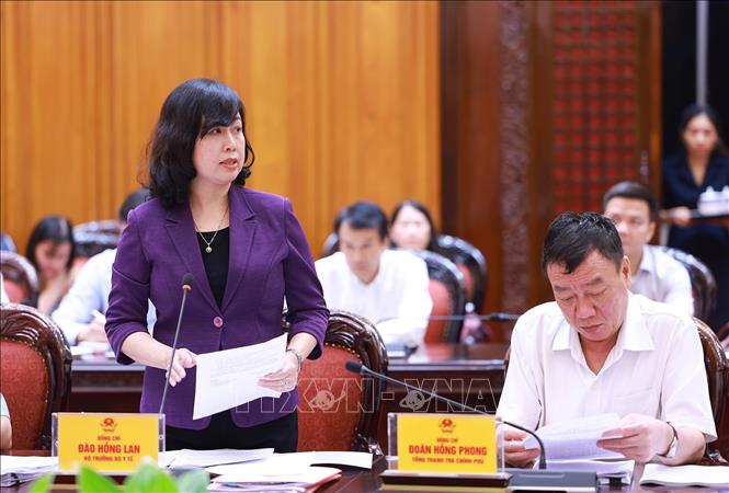 Bộ trưởng Bộ Y tế Đào Hồng Lan trình bày dự thảo Chương trình mục tiêu quốc gia về chăm sóc sức khoẻ nhân dân, dân số và phát triển giai đoạn 2026-2035. Ảnh: Dương Giang-TTXVN 