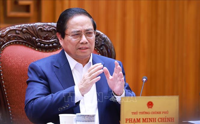 Thủ tướng Phạm Minh Chính chủ trì cuộc họp về dự thảo phát triển giáo dục, đào tạo và chăm sóc sức khoẻ nhân dân. Ảnh: Dương Giang-TTXVN 
