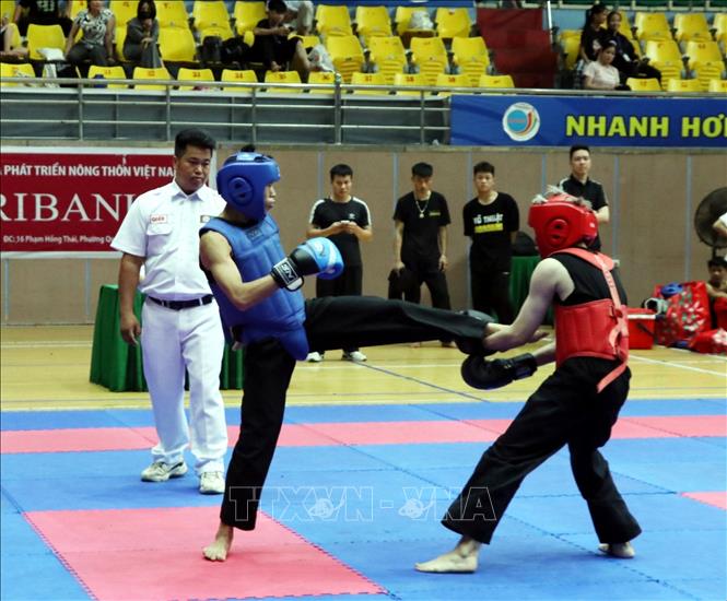 Thi đấu nội dung đối kháng. Ảnh: Mạnh Tú - TTXVN