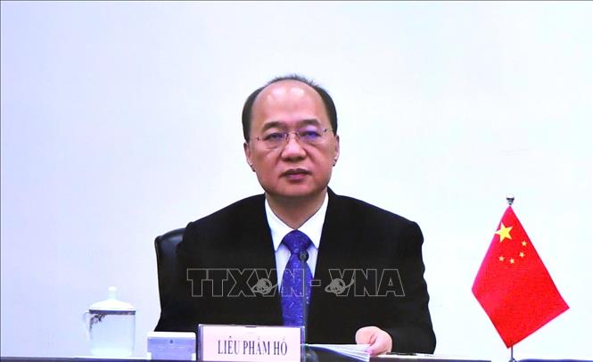 Phó Chủ tịch Chính quyền nhân dân Khu tự trị dân tộc Choang Quảng Tây (Trung Quốc) Liêu Phẩm Hổ phát biểu tại hội nghị. Ảnh: TTXVN phát