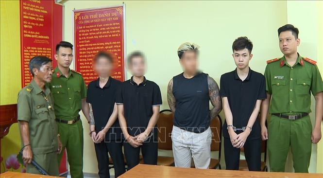 Các đối tượng tại cơ quan Công an. Ảnh: TTXVN phát