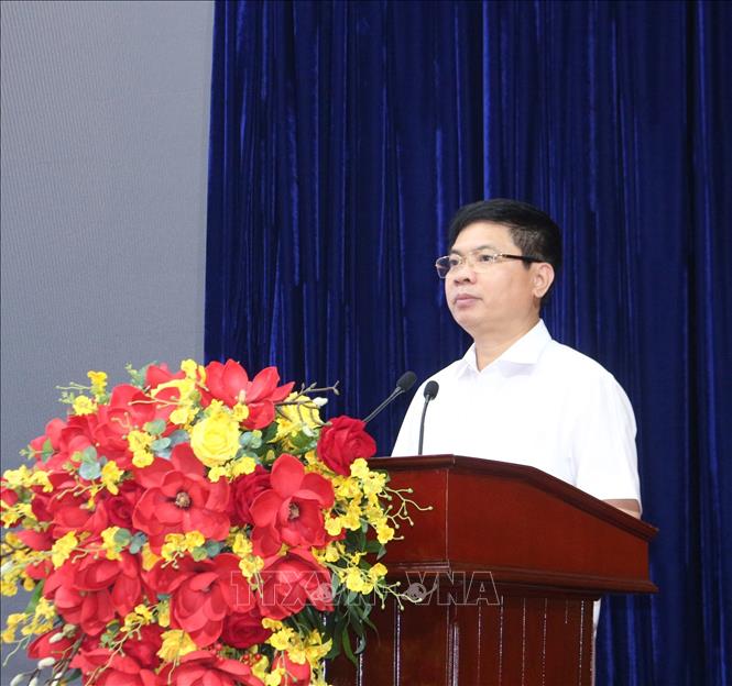 Bí thư Tỉnh ủy, Chủ tịch UBND tỉnh Hà Nam Trương Quốc Huy báo cáo về việc triển khai thực hiện Đề án xây dựng Khu Đại học Nam Cao. Ảnh: Thanh Tuấn - TTXVN  