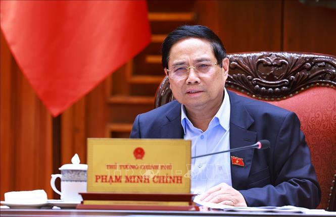 Thủ tướng Phạm Minh Chính chủ trì cuộc họp về tình hình triển khai tuyến đường sắt trọng điểm. Ảnh: Dương Giang-TTXVN