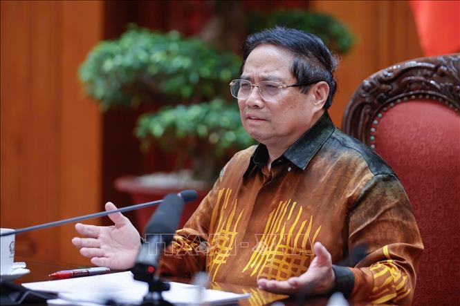 Thủ tướng Phạm Minh Chính chủ trì cuộc họp về Trung tâm tài chính quốc tế tại Việt Nam. Ảnh: Dương Giang-TTXVN
