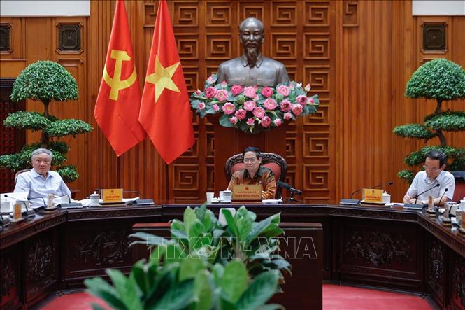 Thủ tướng Phạm Minh Chính chủ trì cuộc họp về Trung tâm tài chính quốc tế tại Việt Nam. Ảnh: Dương Giang-TTXVN
