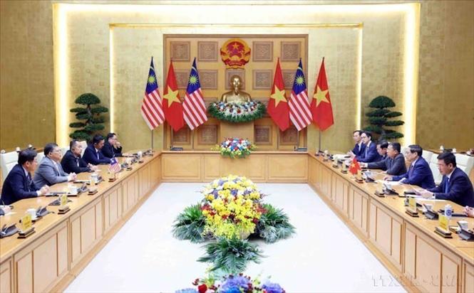 Thủ tướng Chính phủ Phạm Minh Chính hội kiến Chủ tịch Hạ viện Malaysia Tan Sri Dato’ Johari Bin Abdul trong chuyến thăm chính thức Việt Nam (25/10/2024). Ảnh: Phạm Kiên - TTXVN