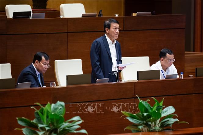 Bộ trưởng Bộ Công an Lương Tam Quang giải trình lãm rõ vấn đề Đại biểu Quốc hội nêu. Ảnh: Phương Hoa - TTXVN