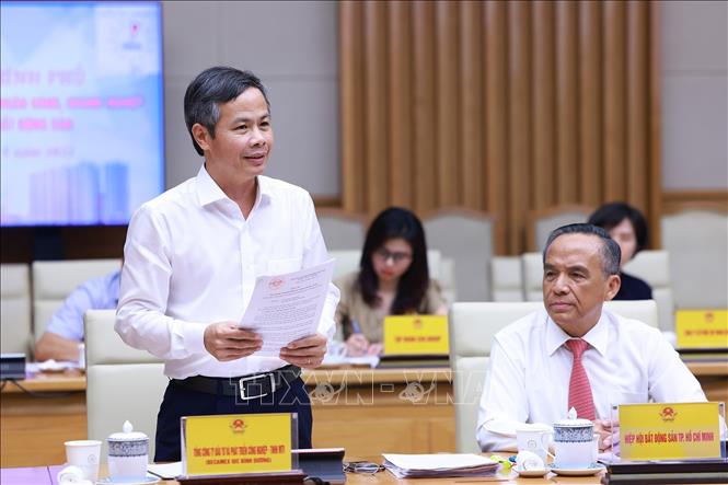 Đại diện doanh nghiệp xây dựng phát biểu. Ảnh: Dương Giang-TTXVN
