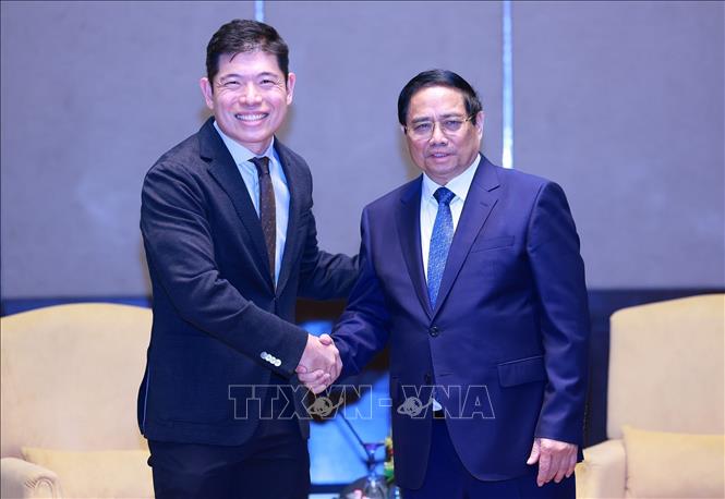 Thủ tướng Phạm Minh Chính tiếp Giám đốc Điều hành và Đồng sáng lập Tập đoàn Grab Anthony Tan. Ảnh: Dương Giang-TTXVN 