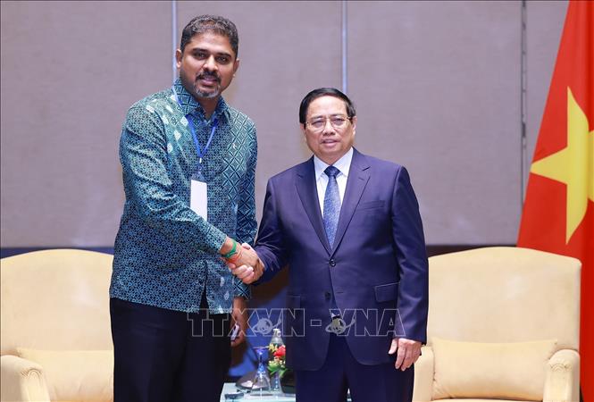 Thủ tướng Phạm Minh Chính tiếp Chủ tịch Phòng Thương mại và Công nghiệp Ấn Độ Kuala Lumpur và Selangor Nivas Ragavan. Ảnh: Dương Giang-TTXVN