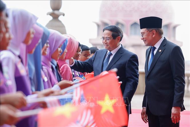 Lễ đón Thủ tướng Phạm Minh Chính thăm chính thức Malaysia. Ảnh: Dương Giang-TTXVN