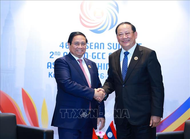 Prime Minister Pham Minh Chinh meets Lao counterpart in Kuala Lumpur ...