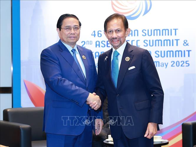 Thủ tướng Phạm Minh Chính gặp Quốc vương Brunei Hassanal Bolkiah. Ảnh: Dương Giang-TTXVN 
