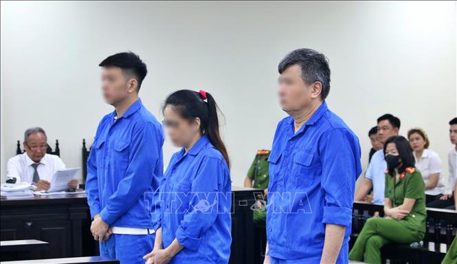 Các bị cáo tại phiên tòa. Ảnh: Kim Anh - TTXVN