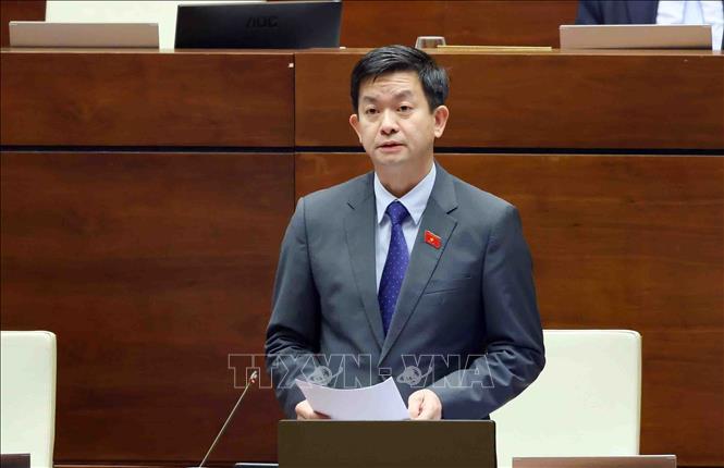 Tổng Thư ký Quốc hội, Chủ nhiệm Văn phòng Quốc hội phát biểu giải trình, làm rõ một số vấn đề đại biểu Quốc hội nêu. Ảnh: Phạm Kiên - TTXVN