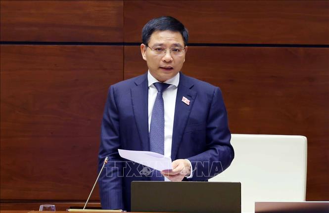 Bộ trưởng Bộ Tài chính Nguyễn Văn Thắng phát biểu giải trình, làm rõ một số vấn đề đại biểu Quốc hội nêu. Ảnh: Phạm Kiên - TTXVN