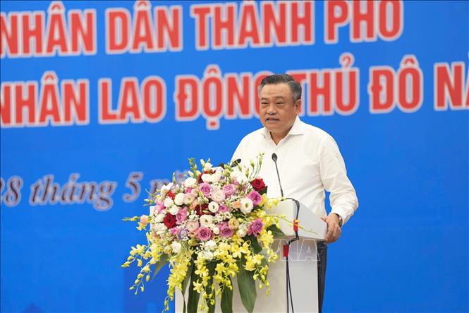 Chủ tịch Ủy ban nhân dân thành phố Hà Nội Trần Sỹ Thanh phát biểu tại buổi đối thoại. Ảnh: TTXVN phát