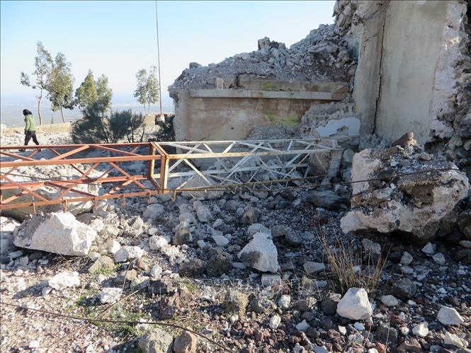 Tòa nhà tại Daraa, Syria bị phá hủy sau cuộc không kích của Israel, ngày 26/2/2025. Ảnh: THX/TTXVN