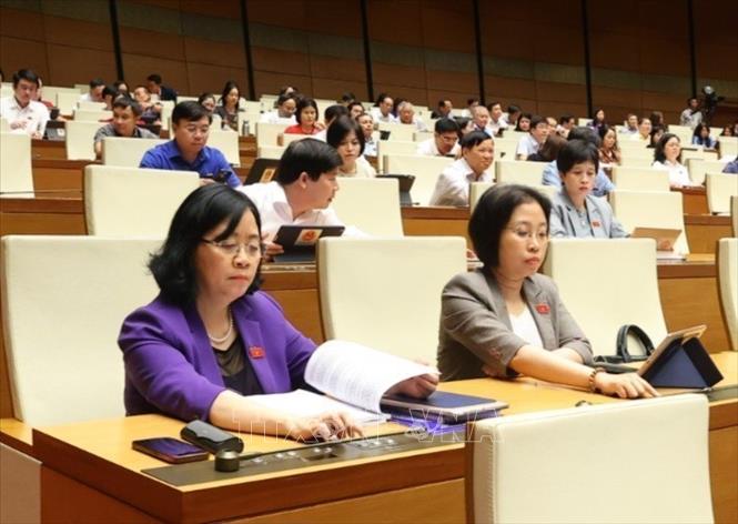 Quốc hội biểu quyết thông qua Nghị quyết của Quốc hội về thí điểm về một số cơ chế, chính sách đặc thù phát triển nhà ở xã hội. Ảnh: Văn Điệp - TTXVN