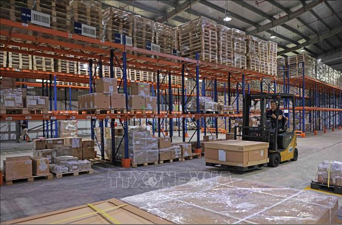 Công ty logistic ASG, Khu công nghiệp Yên Bình, Thái Nguyên đáp ứng nhu cầu kho hàng, vận chuyển hàng hóa xuất nhập khẩu cho nhiều doanh nghiệp trên địa bàn. Ảnh: Trần Việt - TTXVN