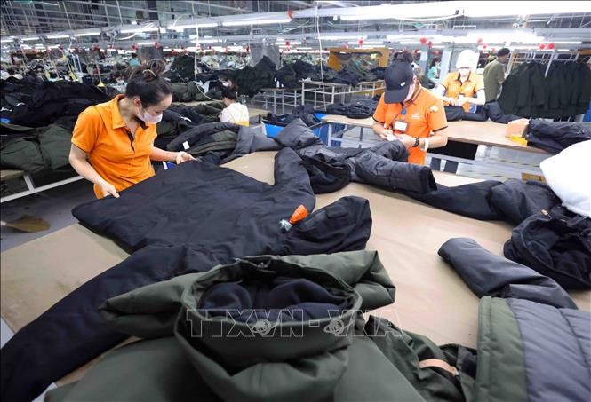 Production at the 100% Korean-invested Jinquan Vietnam Travelling Goods Co. Ltd in Nam Dong Ha IP in the central province of Quang Tri. VNA Photo: Vũ Sinh 