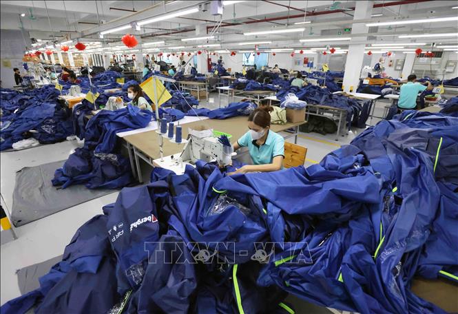 Production at the 100% Korean-invested Jinquan Vietnam Travelling Goods Co. Ltd in Nam Dong Ha IP in the central province of Quang Tri. VNA Photo: Vũ Sinh 