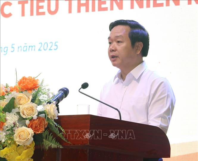 Chủ tịch UBND tỉnh Ninh Bình Phạm Quang Ngọc phát biểu tại tọa đàm. Ảnh: Thùy Dung - TTXVN
