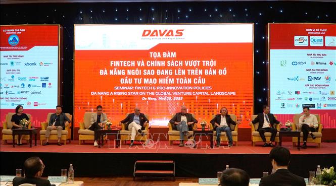 Experts and researchers take part in the event. VNA Photo: Quốc Dũng