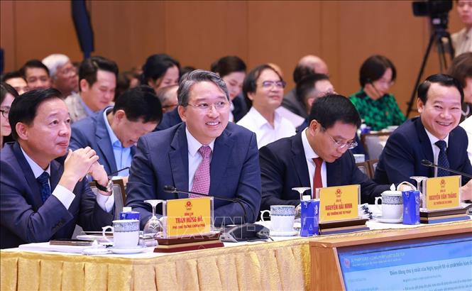 Các đại biểu tham dự Lễ khai trương Cổng pháp luật quốc gia. Ảnh: Dương Giang-TTXVN
