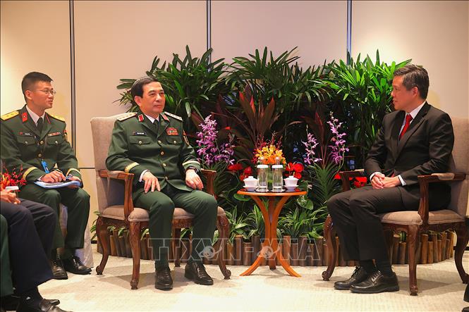 Đại tướng Phan Văn Giang, Bộ trưởng Bộ Quốc phòng có cuộc gặp với Bộ trưởng Bộ Quốc phòng Singapore Chan Chun Sing. Ảnh: Tất Đạt - PV TTXVN tại Singapore
